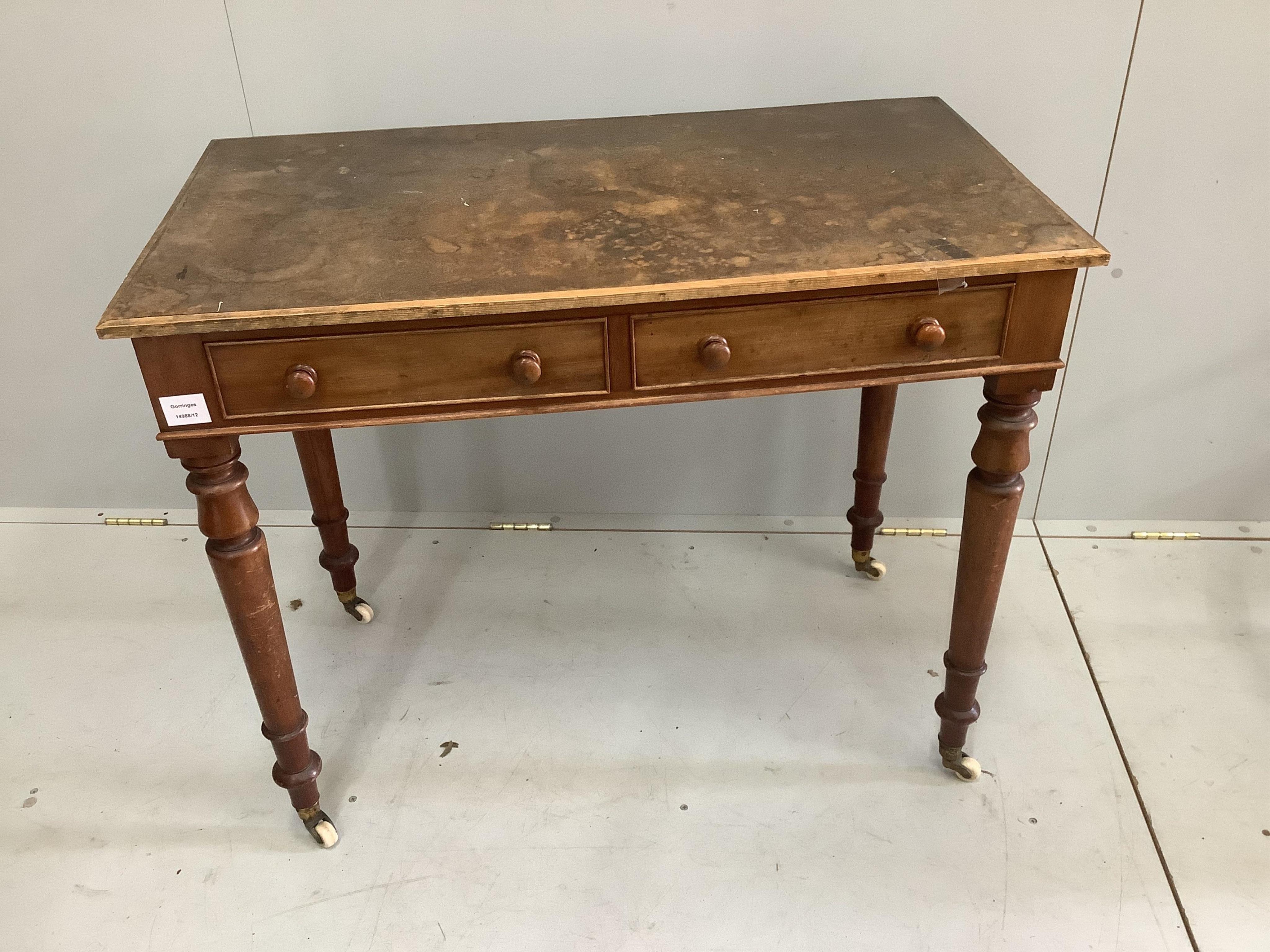 A Victorian mahogany and later two drawer side table with later top, width 91cm, depth 50cm, height 75cm. Condition - poor